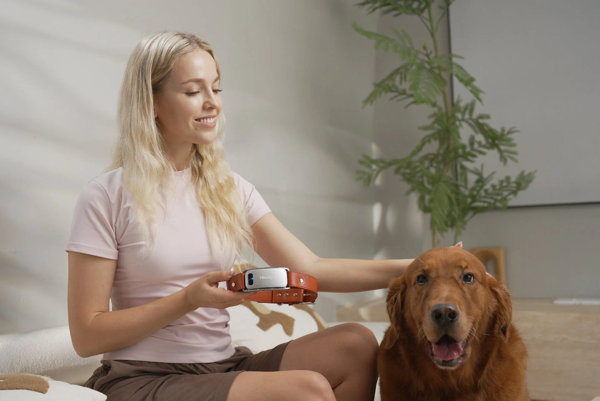 女性とゴールデンレトリバー